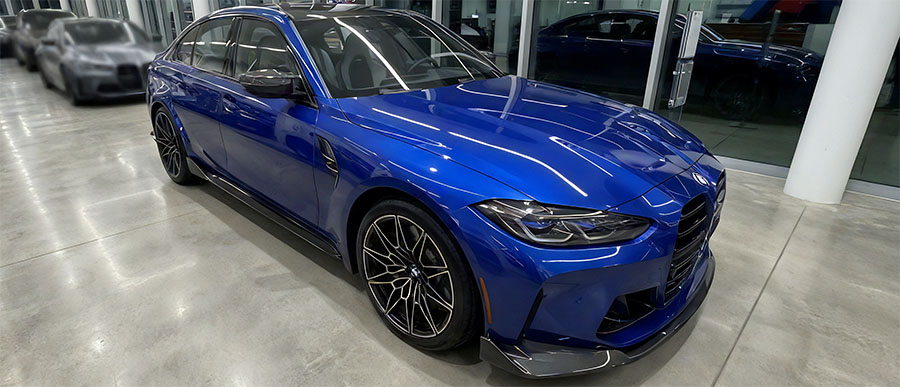 Blue BMW displayed in a dealership